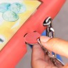Breloc cu moneda pentru cosul de cumparaturi